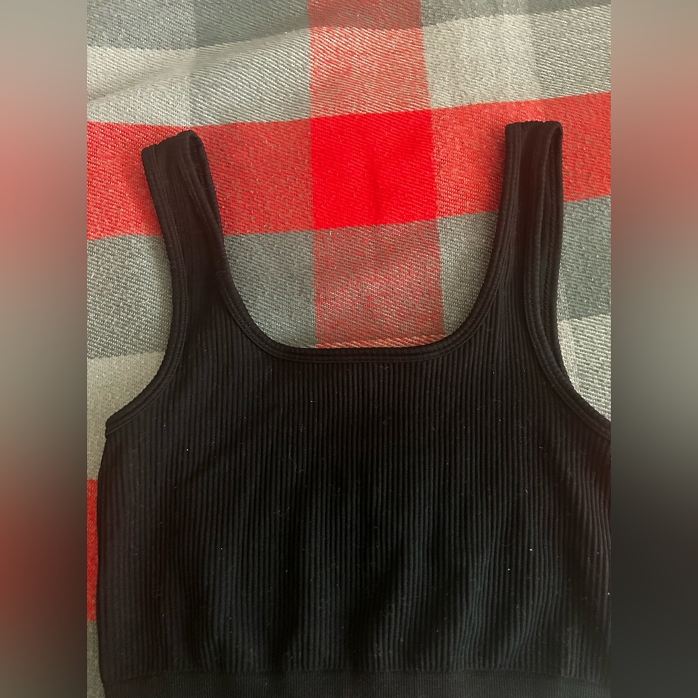 selling both of these black crop tanks
